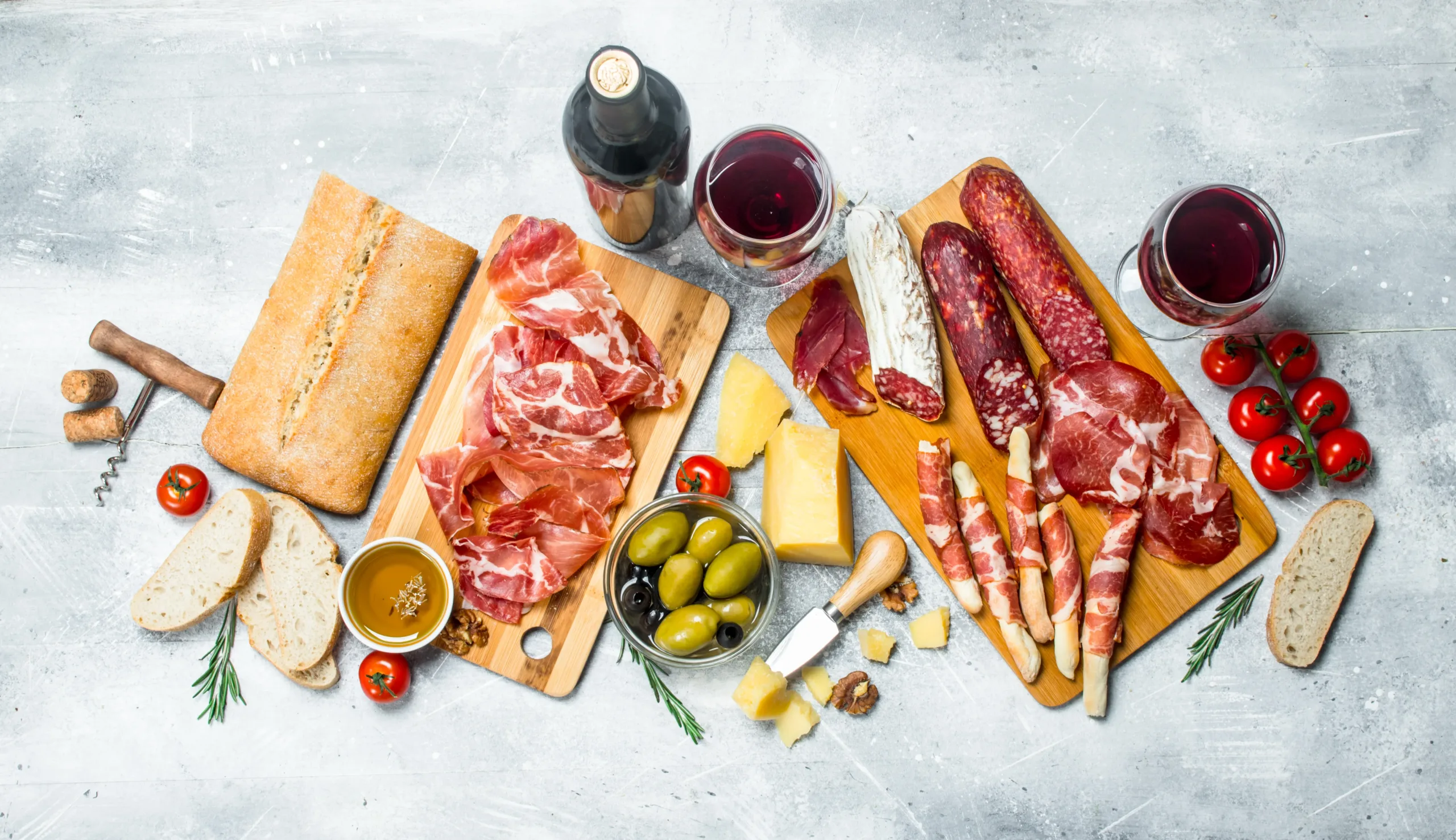 antipasto-background-different-italian-snacks-wit-2026-01-05-00-52-42-utc Unimos tradición, respeto por el origen y elaboración artesanal para ofrecer productos ibéricos que mantienen el sabor de siempre.